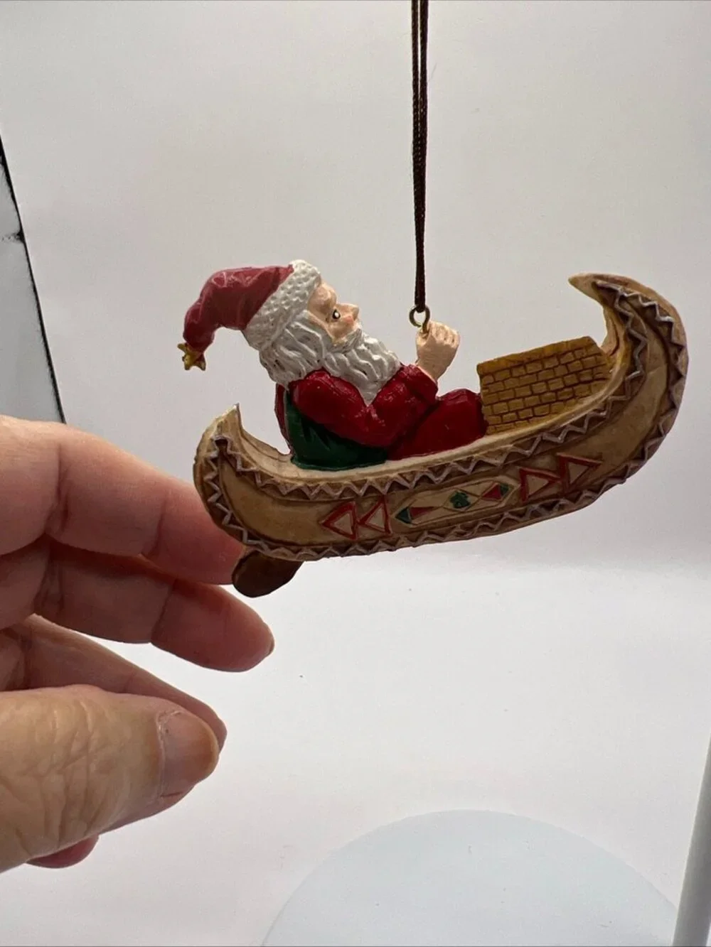 Vtg Santa Paddling His Canoe Folk Art Christmas Ornament 2x3.5”